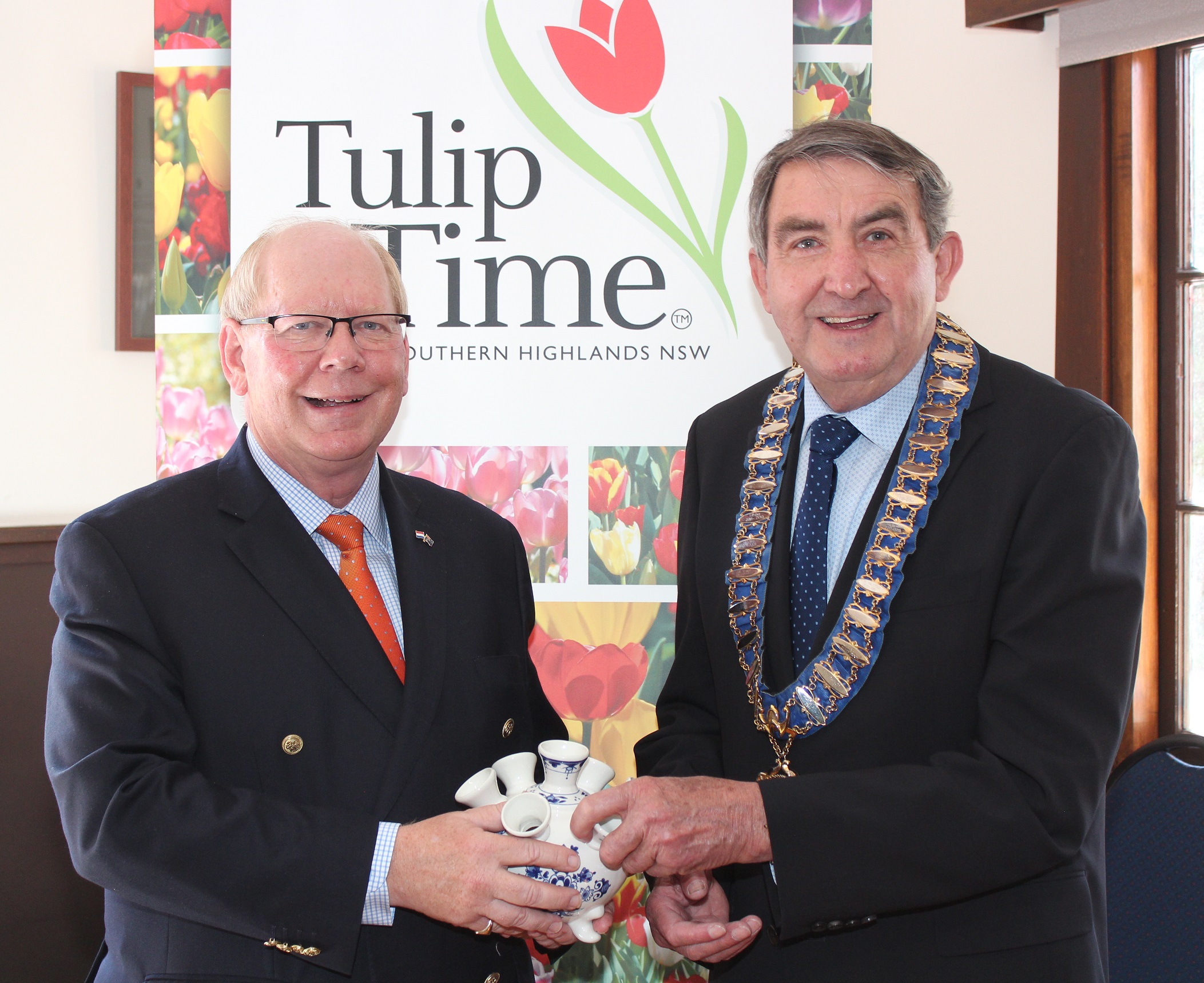 Mr Neuhaus presented Mayor Gair with a porcelain tulip vase from Holland