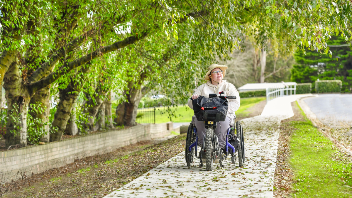 Lady in a wheelchair enjoying the new footpath