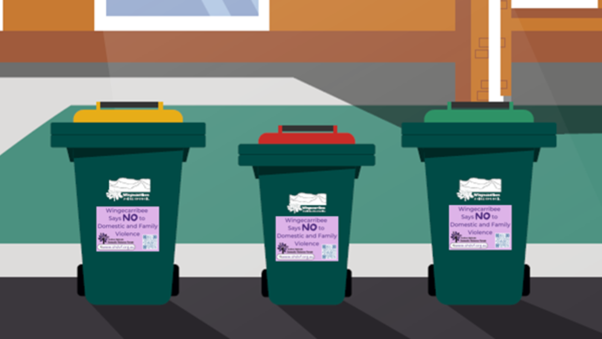 Image of council bins with DV stickers on them